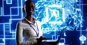 A woman stands proudly in an office with "AI" emblazoned behind her, showcasing the impact of machine learning in marketing environments.