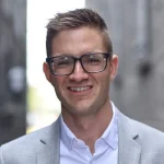 Headshot of a client quoted in the podcast pitching tool testimonials