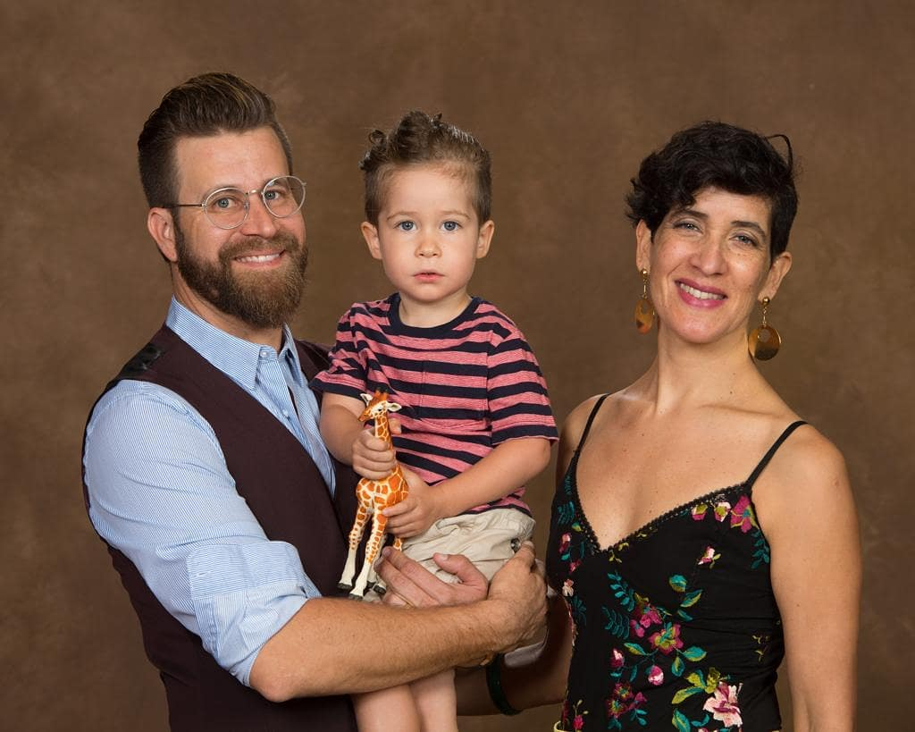 Family portrait of a man, a woman and a toddler