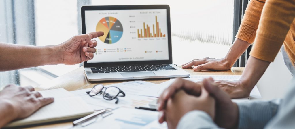 A team of marketing consultant for small businesses discussing growth strategies.