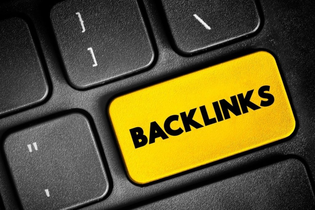 A computer keyboard with a yellow key labelled Backlinks
