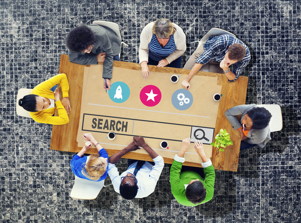 Team working with a SaaS SEO expert on search optimization strategy and performance.
