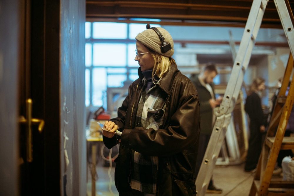 Filmmaker documenting a team at work behind the scenes, illustrating corporate storytelling through real people, environments, and day-to-day moments.
