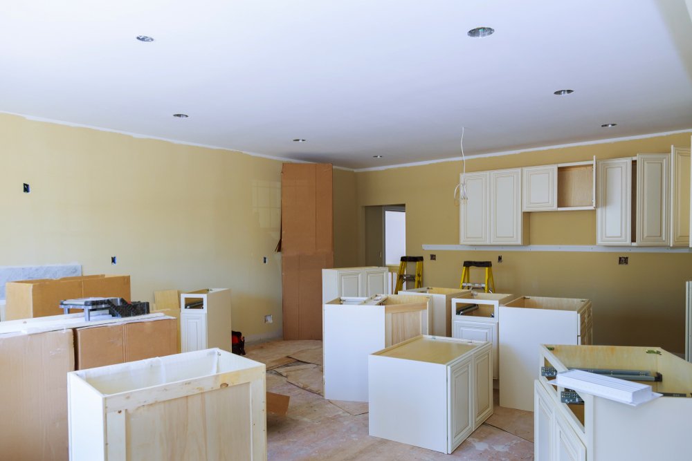 Custom kitchen cabinets at various stages of installation, a home improvement marketing strategy built on job proof