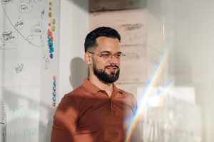 Marketer planning a demand generation strategy at a desk
